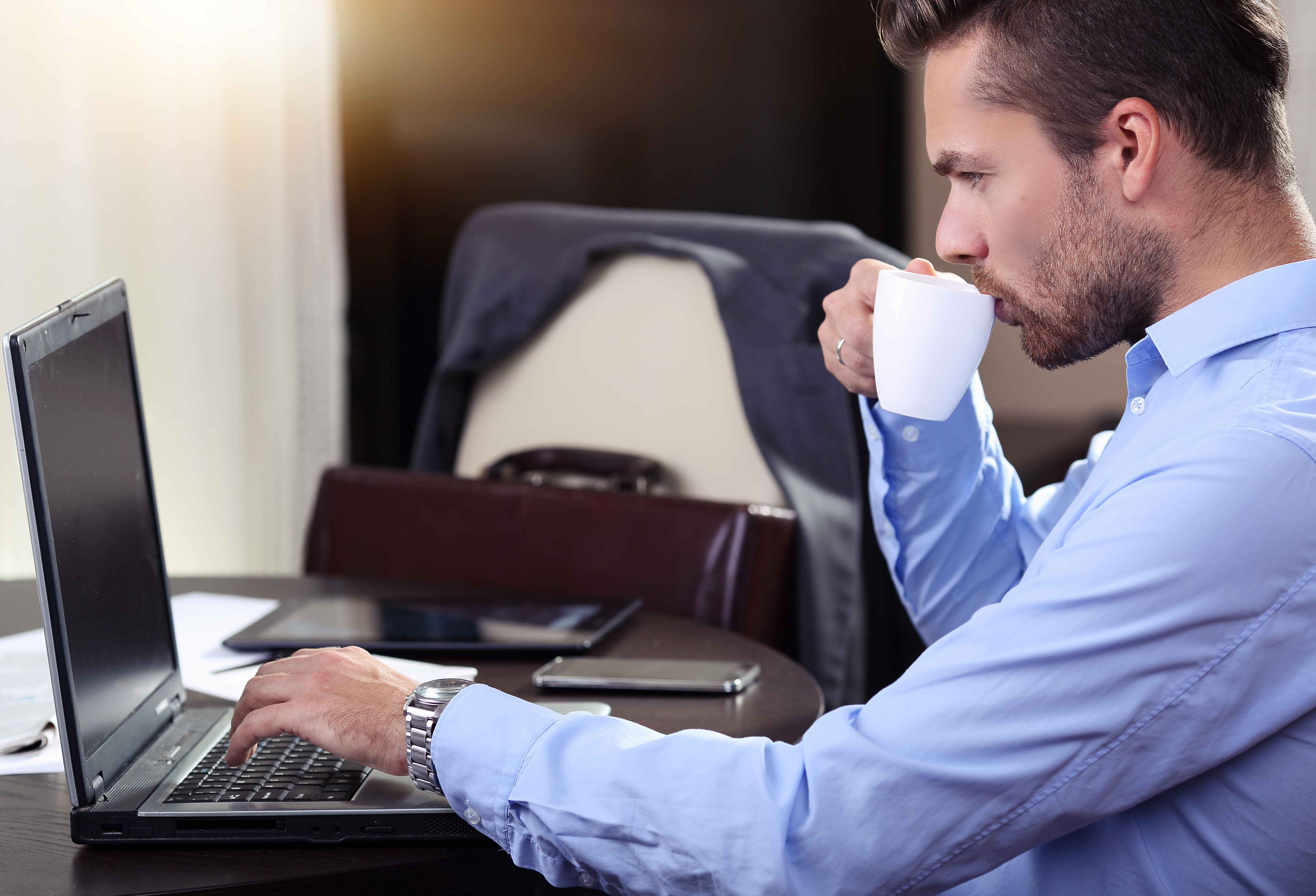 business-man-looking-laptop